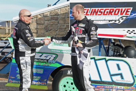 Jim Bernheisel (left) congratulates Bryan Bernheisel. (Barry Lenhart)