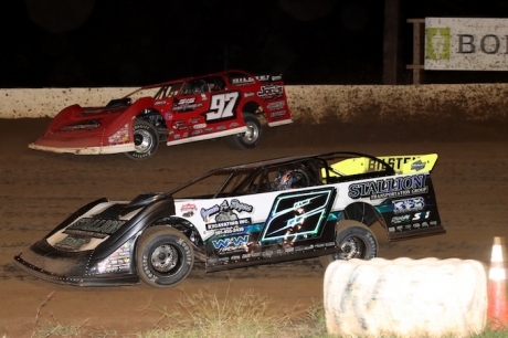 Cade Dillard (97) and Tyler Stevens (2) battle at Boothill. (scottscustomart.co)