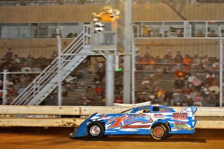 Mike Pegher Jr. takes the checkers at Sharon. (jmsprophoto.com)