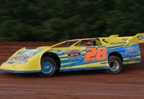 Chris Holley tunes up his No. 28 at Champion Park. (scottscustomart.com)