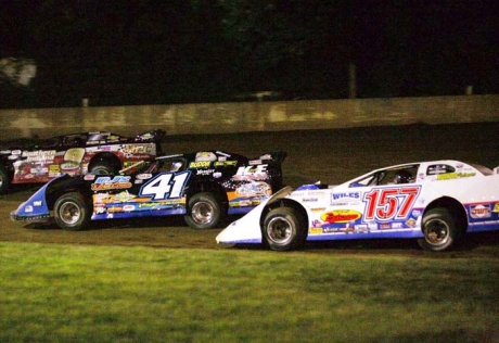 Mike Marlar (157) stalks Josh McGuire (41). (Derrick Strader)