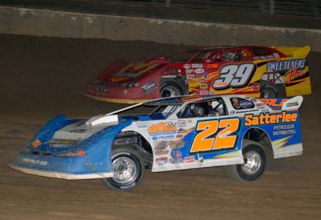 Gregg Satterlee (22) gets past Tim McCreadie in the first heat. (Rich Edwards Jr.)