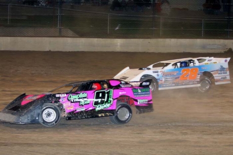 Dennis Erb Jr. (28) stalks polesitter Rusty Schlenk (91). (Jim DenHamer)