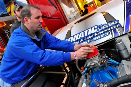 Shane Clanton works on an engine at Volusia. (thesportswire.net)