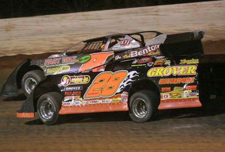 Eddie Carrier Jr. (28) chases Dustin Linville (D8). (Derrick Strader)