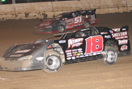 Winner Shannon Babb (18) takes third from Mark Faust (51). (Jim DenHamer)