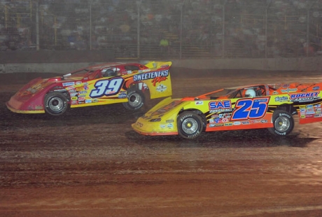 Shane Clanton (25) stalks Tim McCreadie (39). (stivasonphotos.com)