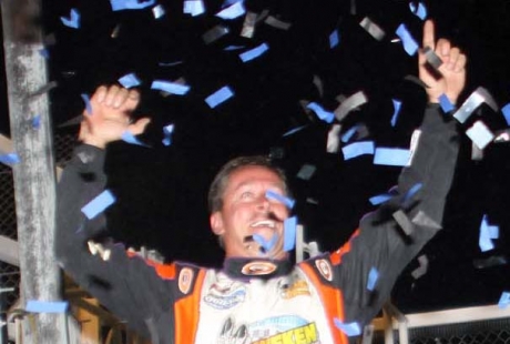 Rick Eckert celebrates in victory lane. (Jim DenHamer)