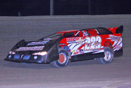 Mike Boland heads for victory Friday. (Best Photography)