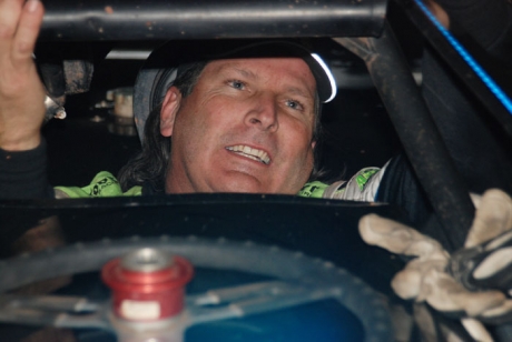 Bloomquist climbs from his winning car. (DirtonDirt.com)