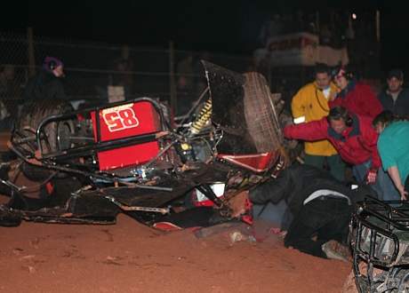 Officials check on Mark Andersen. (ronskinnerphotos.com)