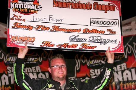 Feger shows off his 2010 Summernationals earnings. (Steve Datema)