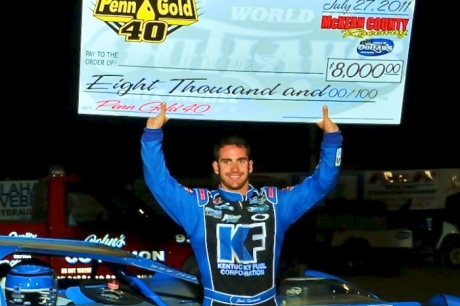 Josh Richards shows off his $10,000 check at McKean County. (Joe Nowak)