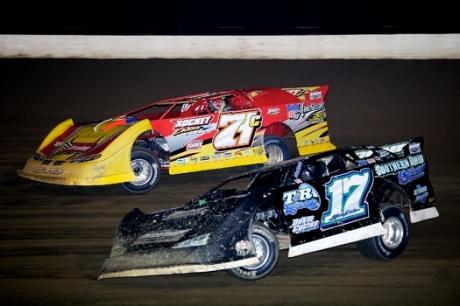 Winner R.J. Conley (71c) and Tim Dohm (17) battle at Portsmouth. (Mark Bias)