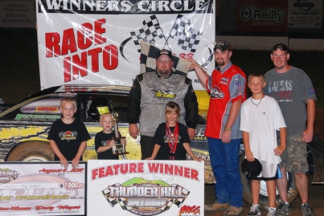 Chris Spieker enjoys victory lane at Thunder Hill. (MDLMS)