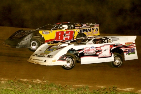 Winner Butch McGill (1mc) gets past runner-up Booper Bare (83). (Tommy Michaels)