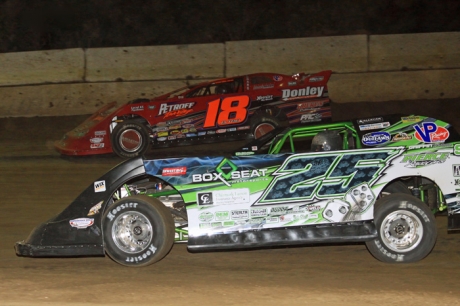 Shannon Babb (18) battles Jason Feger (25) at Highland. (stlracingphotos.com)