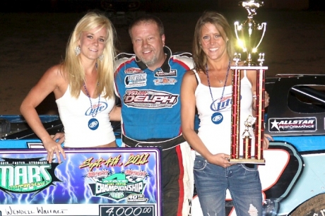 Wendell Wallace enjoys victory lane at Monett Speedway. (Ron Mitchell)