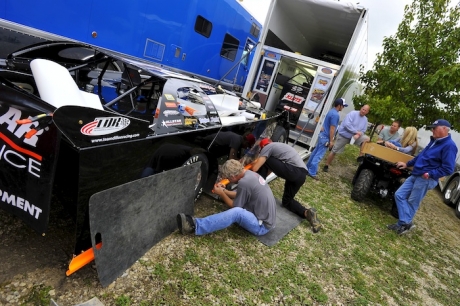 Austin Dillon's team works on his car briefly Thursday at Eldora Speedway. (thesportswire.net)