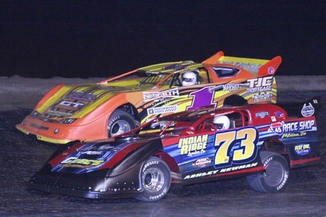 Winner Ashley Newman (73) goes by Johnny Stokes (1) at Greenville. (Best Photography)