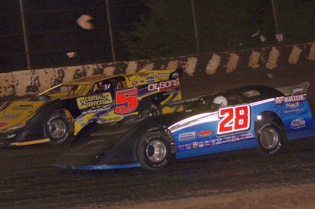 Dennis Erb Jr. (28) overtakes Bret Sievert (5) at La Salle. (Jim DenHamer)