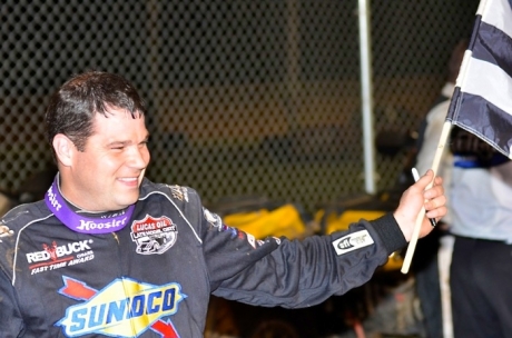 Brad Neat enjoys victory lane at North Alabama. (photobyconnie.com)