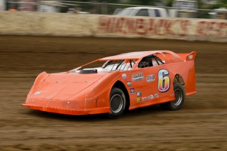 Jesse Stovall tunes up before his victory at Thunderbird. (hmmphoto.com)