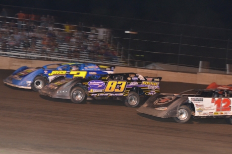 Brian Shirley (3) inches ahead of Scott Bull (83) at Fairbury. (Rocky Ragusa)