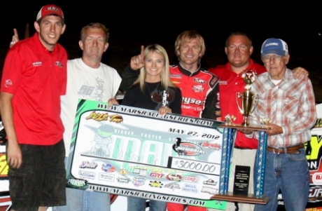 Tony Jackson Jr. celebrates with supporters after his $3,000 MARS victory. (Ron Mitchell)