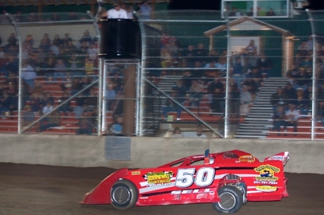 Russ Sell takes the checkers at Willamette Speedway. (raceimages.net)