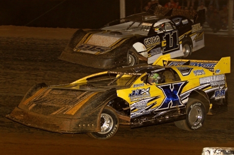 Bud Mullins (X) races his father Bubba Mullins (c11) en route to his first Late Model victory. (Woody Hampton)