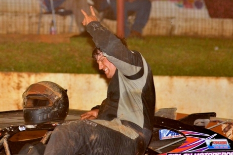 Aaron Ridley climbs out of his car at Sugar Creek Raceway. (photobyconnie.com)