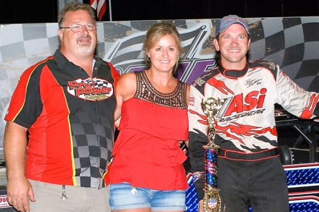 Brian Birkhofer celebrates with Bill and Josie Schlieper of Pro Power Engines. (Rocky Ragusa)