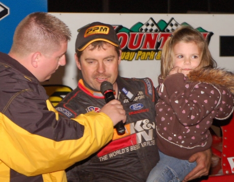 Ray Cook enjoys victory lane. (Mike Nuchols)