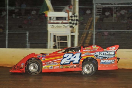 Kenny Moreland takes the checkers for his first Winchester (Va.) Speedway victory, (Travis Trussell)