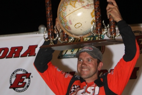 Brian Birkhofer shows off his second globe trophy. (Jeremey Rhoades)