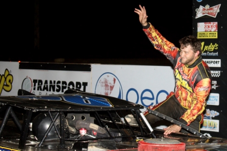 Kyle Beard climbs from his car. (Ron Mitchell)