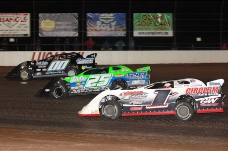 Chad Simpson (25) battles his way to victory at Wheatland. (cbracephotos.com)