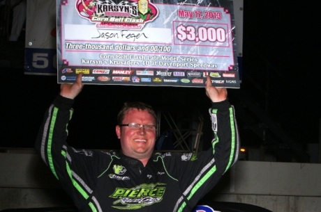 Jason Feger enjoys victory lane at Davenport Speedway. (John Vass)