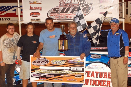 Robbie Starnes and his team enjoy victory lane at Lone Star. (Alton Cotton)