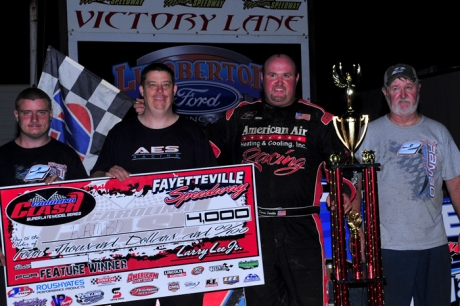 Dennis Franklin enjoys victory lane at Fayetteville. (focusedonracing.com)