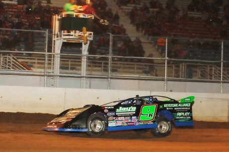 Mike Knight takes the checkers at McKean County. (Joe Nowak)