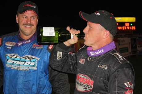 Runner-up Clint Smith looks on as winner Darrell Lanigan celebrates. (Kevin Kovac)