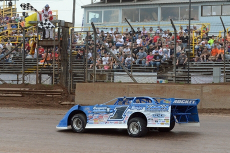 Josh Richards takes the checkers Saturday afternoon. (Jason Shank)