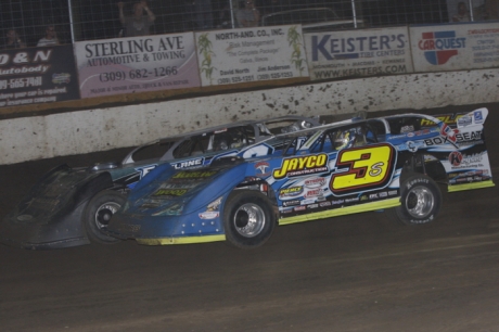 Brian Shirley (3) battles Mike Spatola on the final lap at Peoria. (Jim DenHamer)