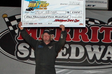 Rich Neiser climbed atop his car to celebrate. (Bob Steele)