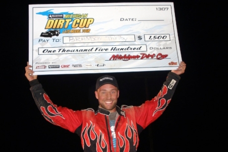 Brandon Thirlby shows off his big paycheck. (Steve Datema)