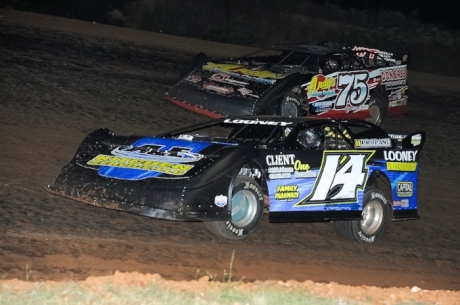 Winner Brad Looney (14) battles Terry Phillips (75). (Mike Musslin)