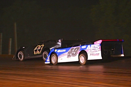 Chris Madden (44) turns back Jonathan Davenport (49) at EAMS. (Heath Lawson)