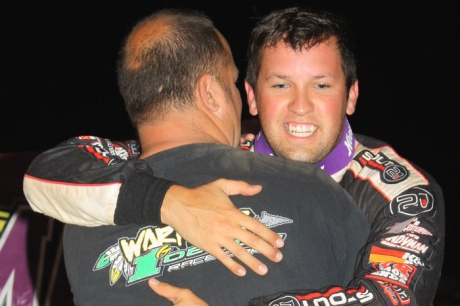 Winner Chris Ferguson gets a hug from his dad. (Gene Murphy)